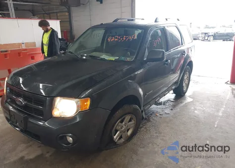 2009 Ford Escape Hybrid из США, поврежденный, VIN 1FMCU49339KB19700